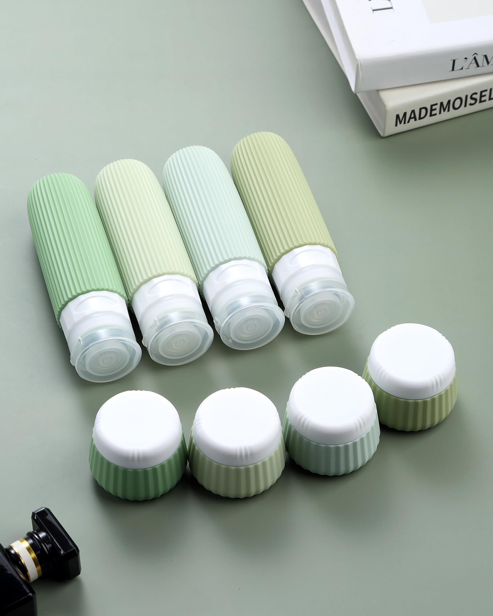Gemice 8pc Travel Size Toiletries Set - TSA Approved, Leak Proof, Wide Opening, Portable Silicone Squeezable Bottles & Cream Jars with Clear Bag