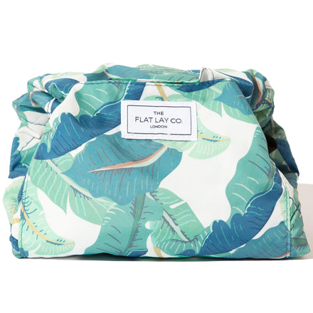 The Flat Lay Co. Makeup Bag - Tropical Leaves Travel Drawstring Makeup Bag with Brush Holder & Large Pockets - Cosmetics Organiser Storage for Eyeshadow, Blushes, Lipstick, & Brushes