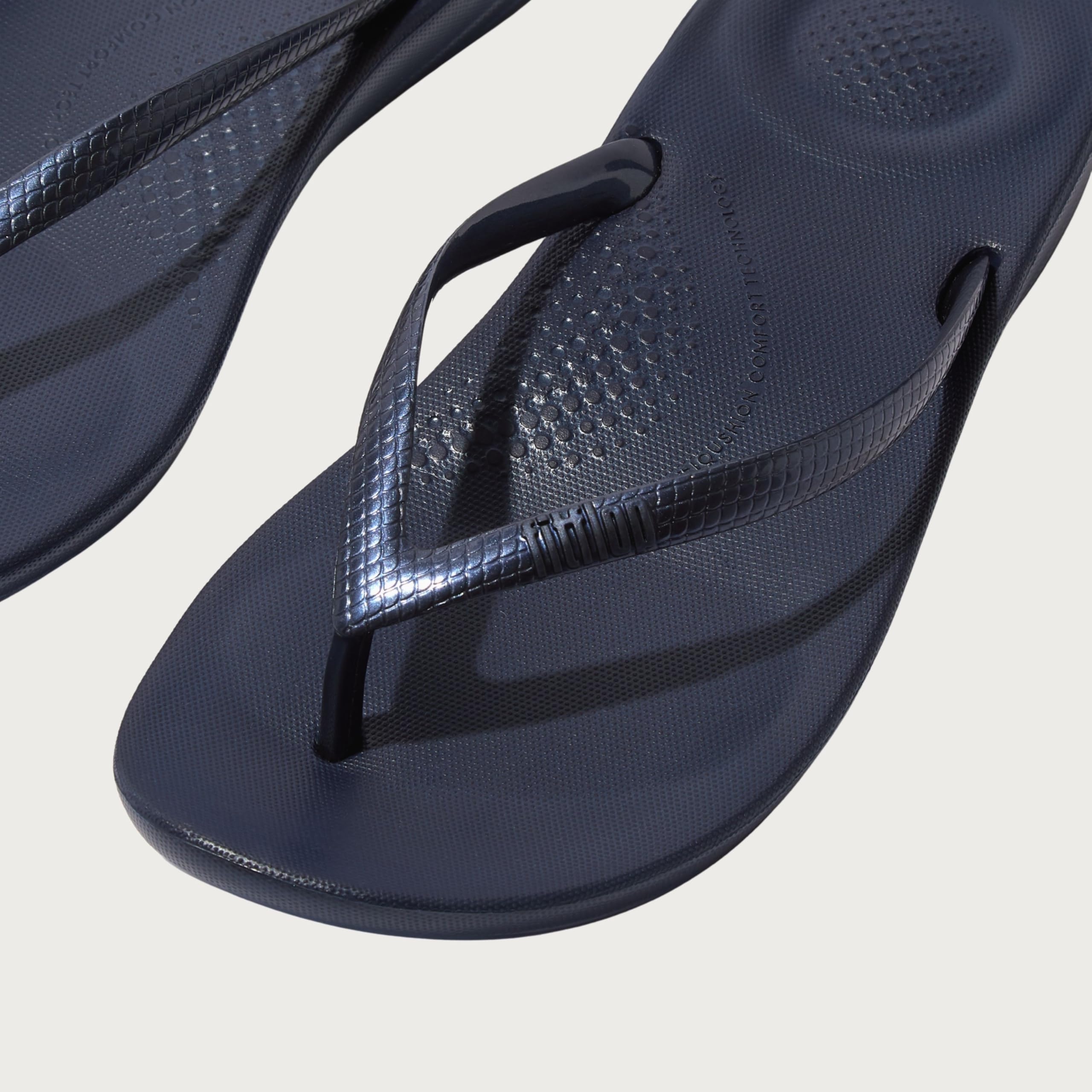 FitFlop Women's iQushion Rubber Flip-Flips with Contoured Footbed for Walking, Lightweight Ergonomic Flip Flop Sandals with Arch Support and Foot Impact Pillows, Midnight Navy, 7 US Women