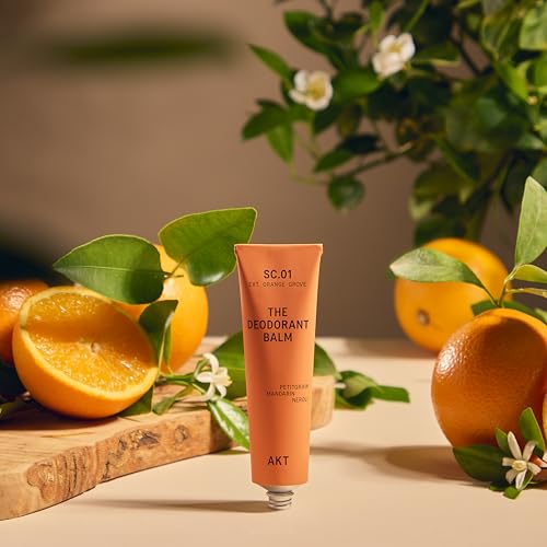 AKT, THE DEODORANT BALM. Award winning, multi-use, natural deodorant. Plastic Free. Gender Free. Aluminium Free. 100% effective — 1 tube lasts up to 3 months. SC.01 ORANGE GROVE. 50ml